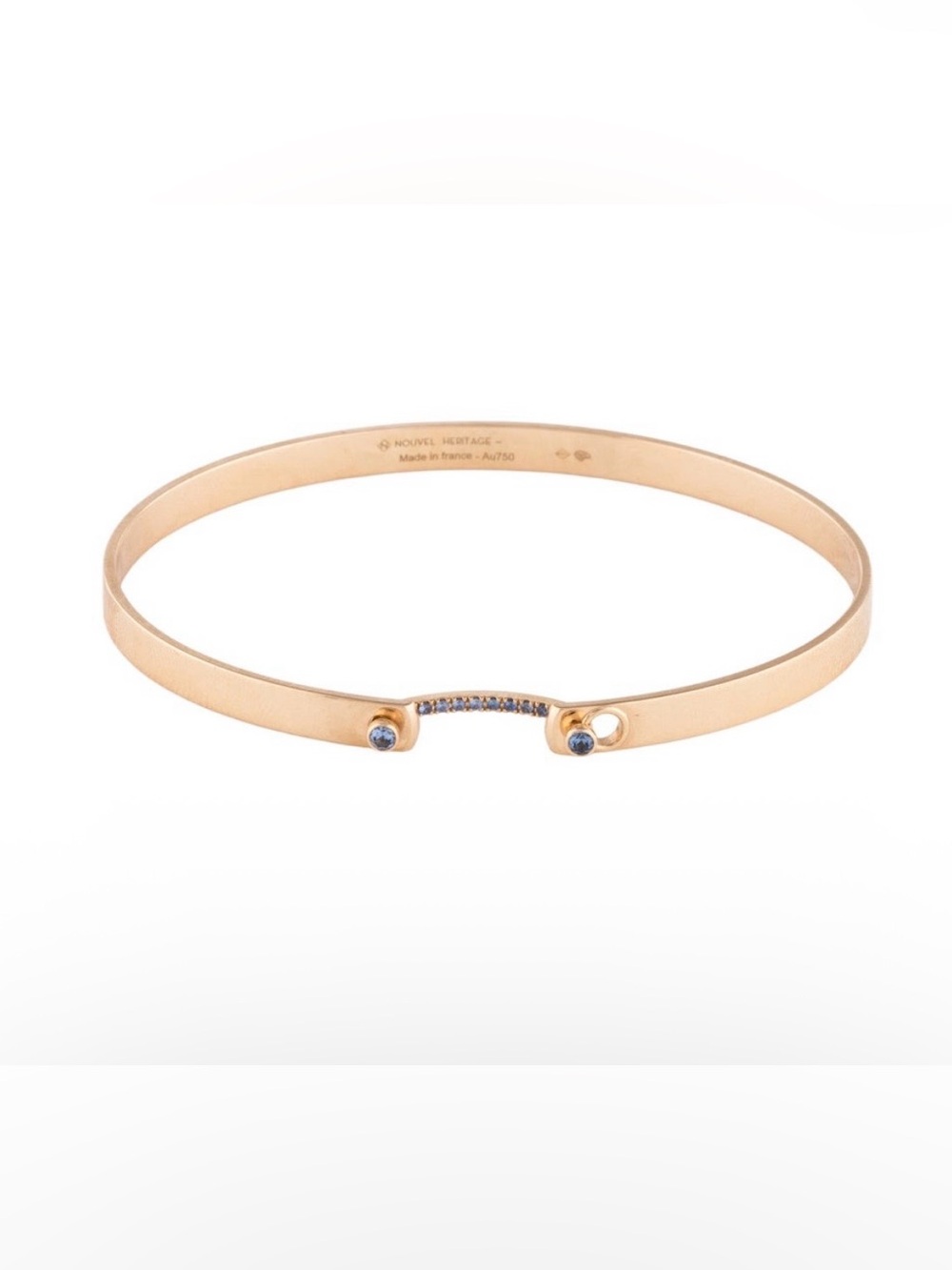Nouvel heritage yellow gold mood bangle withe light blue Sapphires